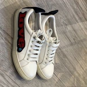 White Marc Jacob’s sneakers with red and blue shiny gemstones “love”